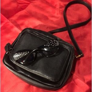 Liz Claiborne black purse/clutch/bag and black sunglasses.
